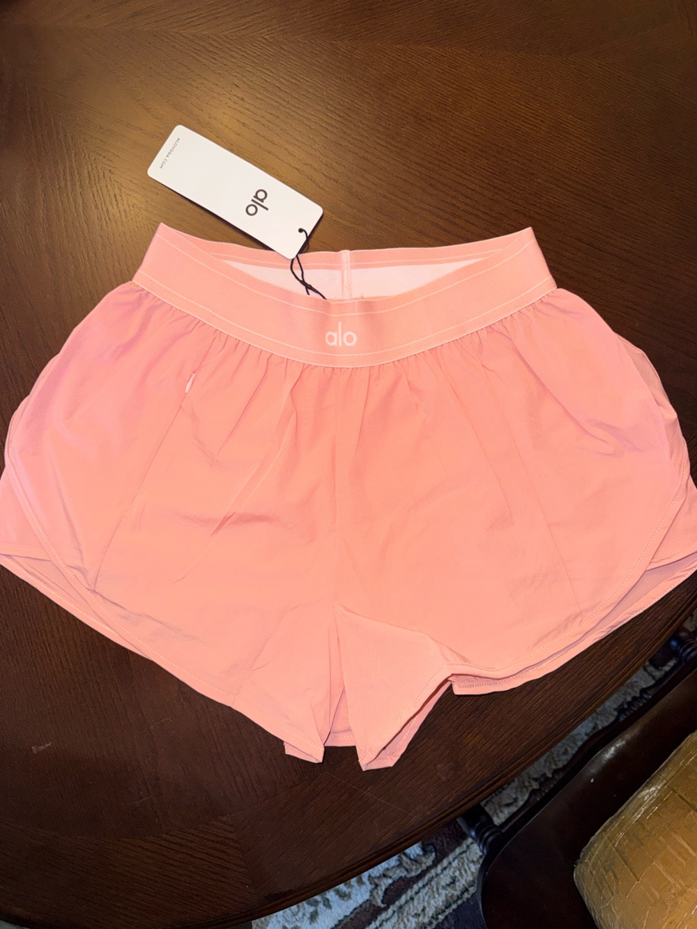 ALO Yoga Women's Light Pink Athletic Shorts with Wide Waistband